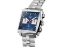 Luxury men's watch with square blue dial, silver bracelet, and chronograph design