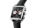 Luxury men's square black dial watch with leather strap, silver case, and red accents