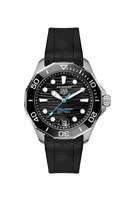 TAG Heuer Aquaracer black dive watch with rubber strap, silver bezel, and luminous markers