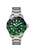 TAG Heuer Aquaracer stainless steel watch with green dial and GMT bezel on black background