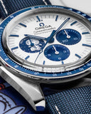Omega Speedmaster 50th Anniversary chronograph with blue bezel and subdials on fabric strap